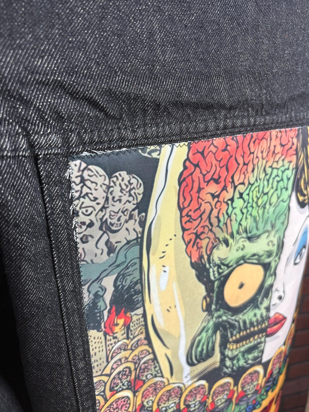 Close-up of stitched Mars Attacks back graphic