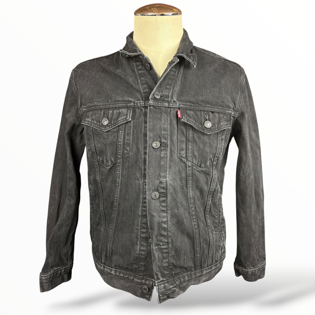Front of black Levi's denim jacket