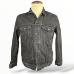 Front of black Levi's denim jacket