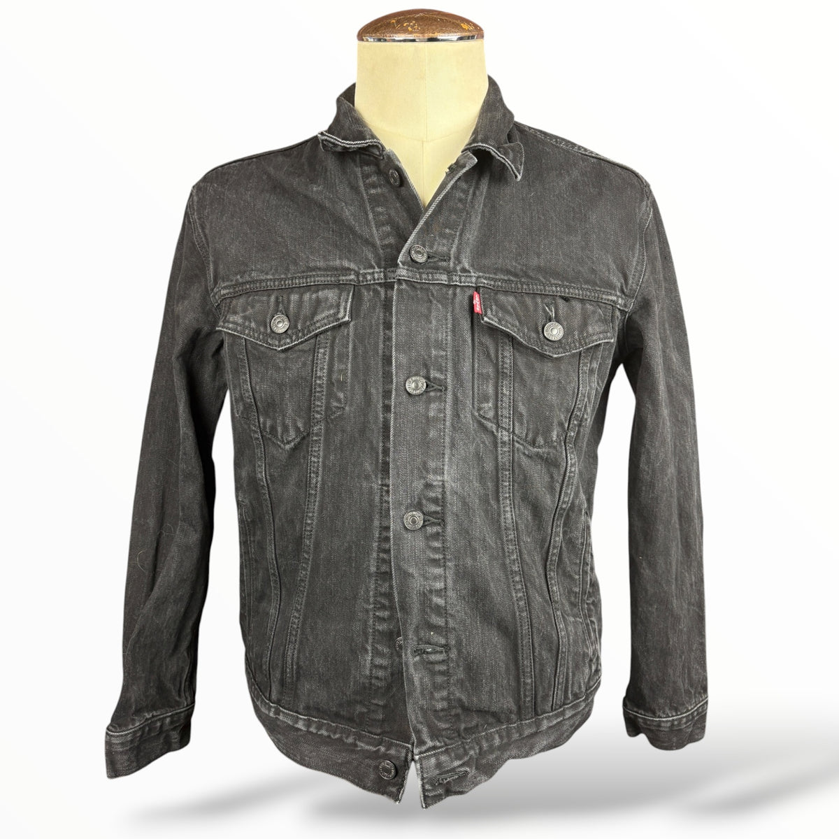 Front of black Levi's denim jacket