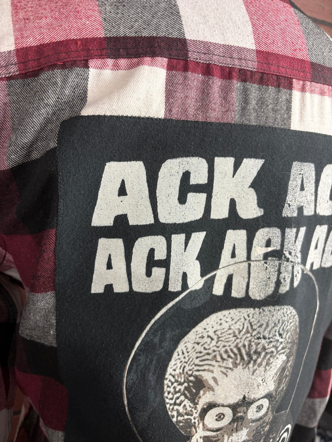 Close-up of the Mars Attacks! Ack Ack patch stitching